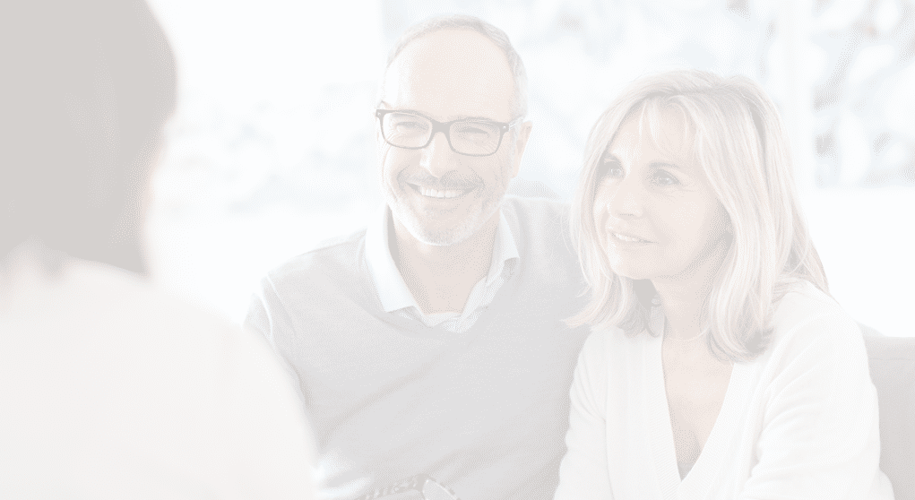 Senior couple meeting financial adviser for investment